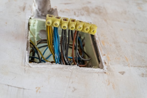 Electrical wires connected with yellow terminal blocks